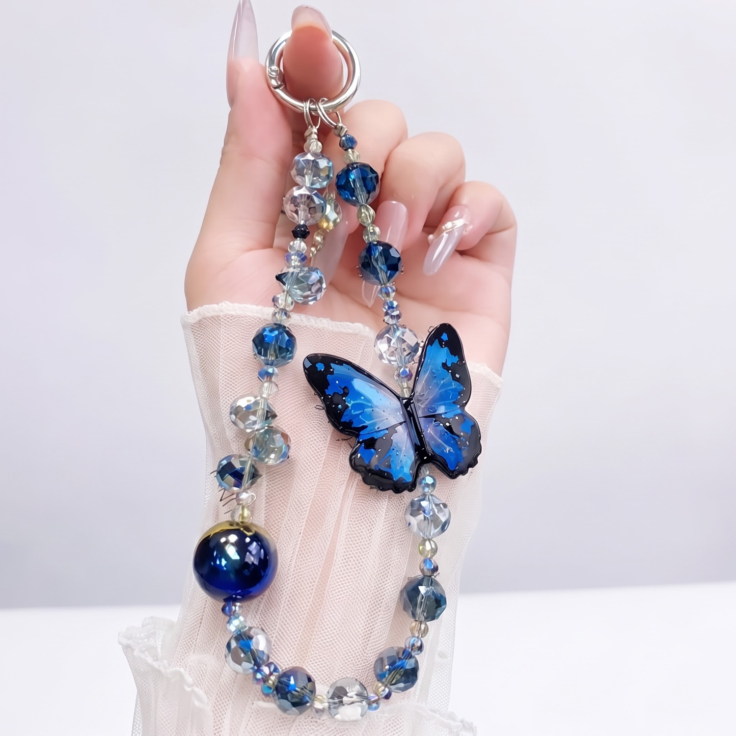 Oppo Reno 15 5G Luxury Shimmer Airbag Butterfly Stand Case with Charm Strap